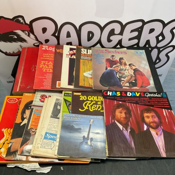 Vintage vinyl record collection featuring Chas and Dave and The Seekers.