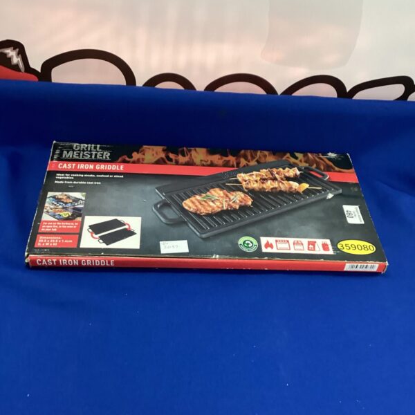 Grill Meister cast iron griddle for cooking steaks and more.