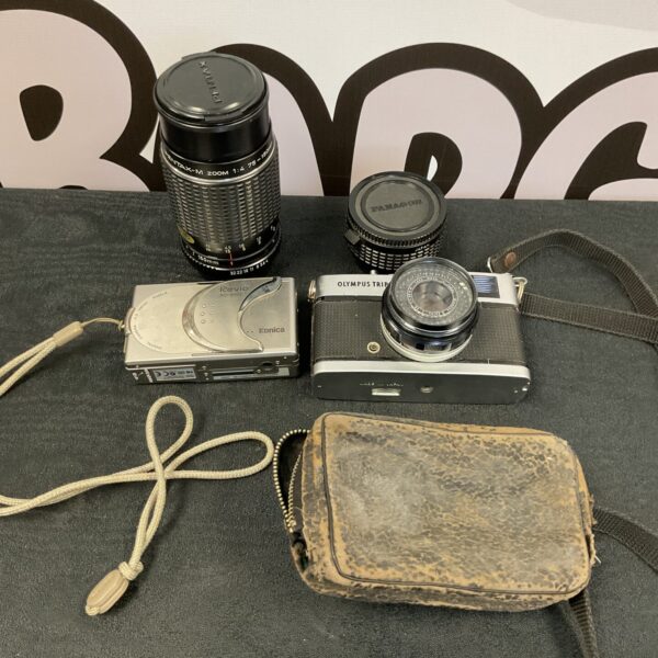 Vintage Pentax M-Zoom lens with Olympus Trip 35 and Konica Revio camera.