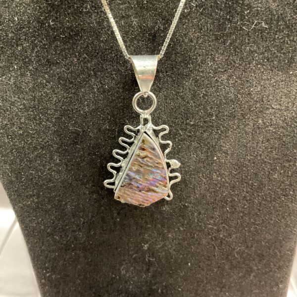 Iridescent abalone shell necklace with silver chain.