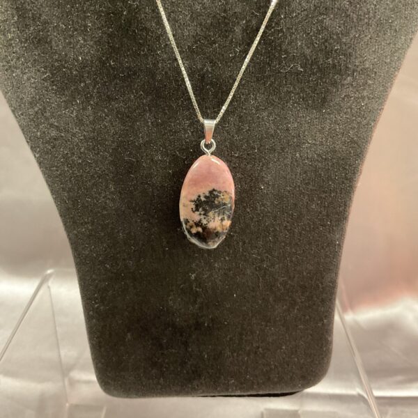 Silver rhodonite pendant necklace with a 16 inch chain.