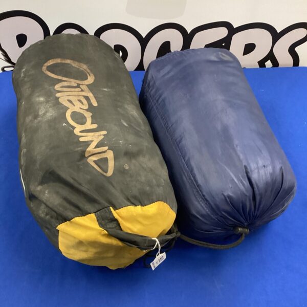 Two rolled sleeping bags, one blue and one yellow, for camping.
