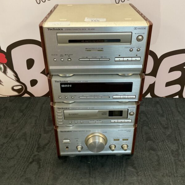 Black Technics mini hi-fi system with cassette deck and CD changer.