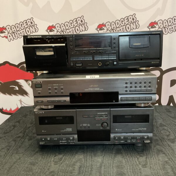 Vintage Pioneer and Sony cassette deck and amplifier stereo system.