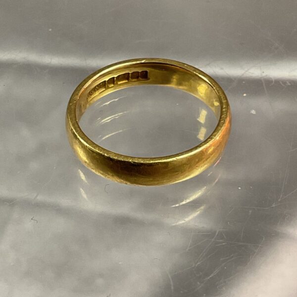Classic 22ct gold band ring, size L, plain design.