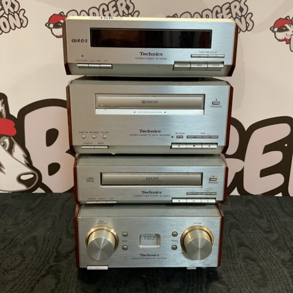 Vintage Technics SE-HD560 mini system with amplifier, cassette deck, and CD player.