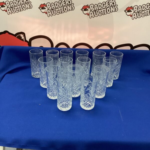 Set of fifteen vintage cut glass beakers for serving drinks.