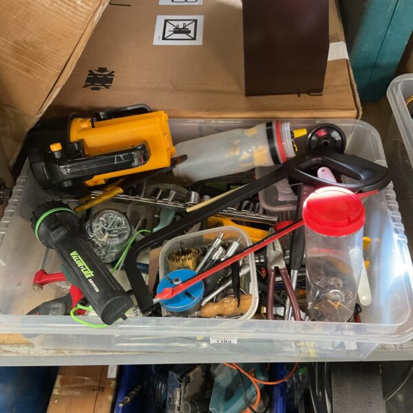 Mixed tool tray with saws, torches and socket set for DIY projects.