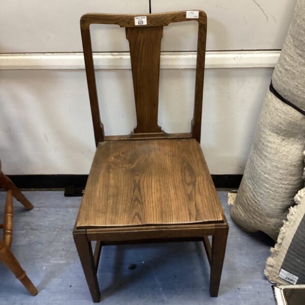 Front view of a vintage reproduction Chippendale chair.