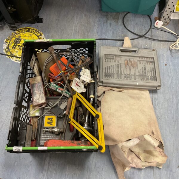 Mixed tool lot with drill bits and hand tools in a tray.