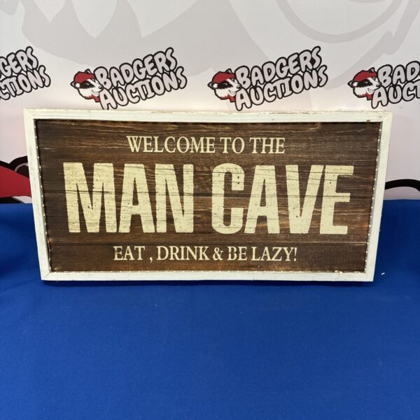 Illuminated wooden man cave sign for retro home decor.