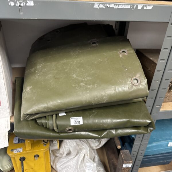Pair of heavy-duty tarpaulins for industrial or outdoor use.
