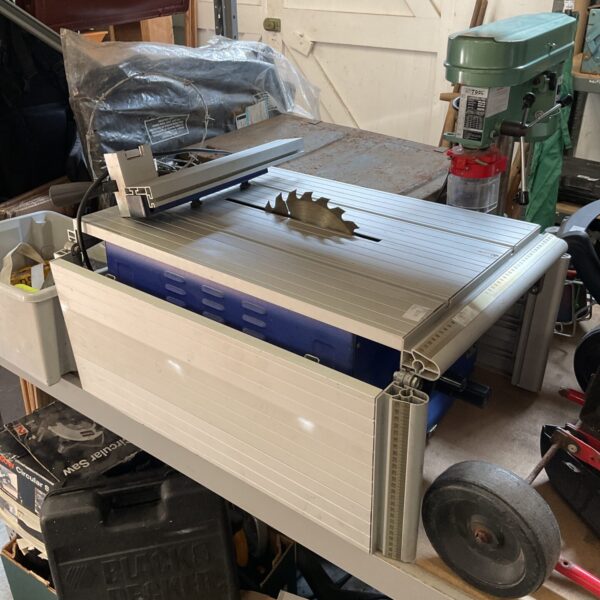 Close-up of an electric table saw for woodworking projects.