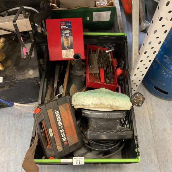 Mixed tool lot including car polisher and drill bits for DIY projects.