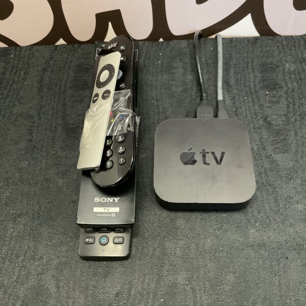 Apple TV with Sky and Sony remotes for television control.