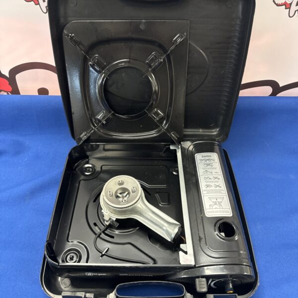 Higear camping stove in a plastic carrying case.