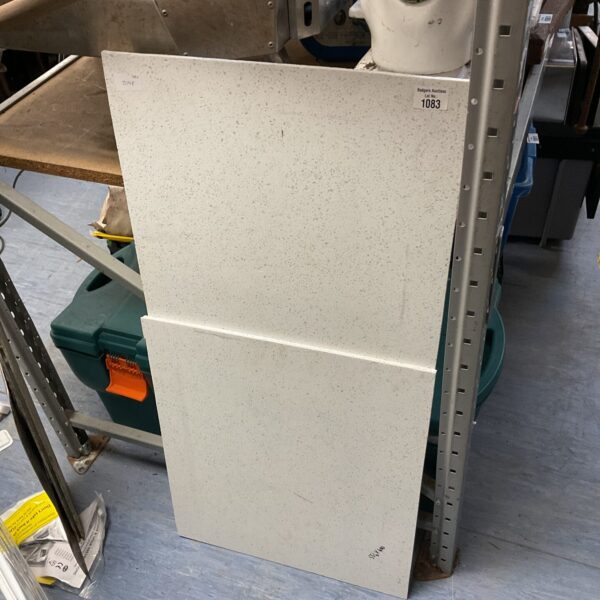 Close-up of marble worktops with natural stone veining.