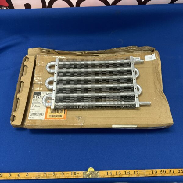 Motorsport oil cooler radiator for engine performance cooling.