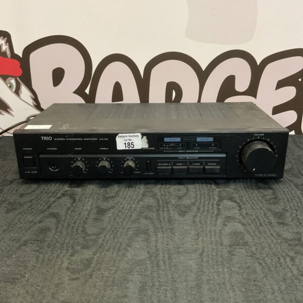 Vintage Trio KA-34 amplifier with control knobs and classic design.