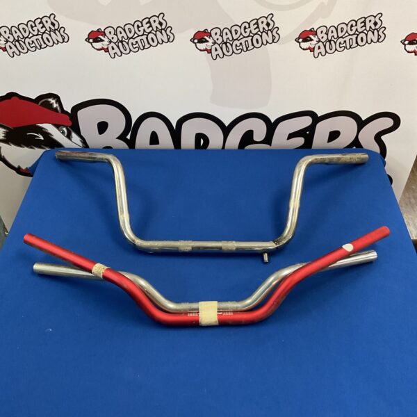 Chrome motorcycle handlebars lot for restoration or custom builds.