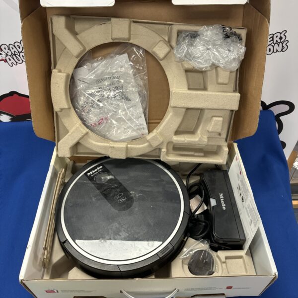 Miele scout RX1 robot vacuum cleaner, side view.