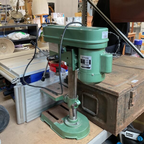 Vintage Nutool pillar drill for repair, workshop machinery.