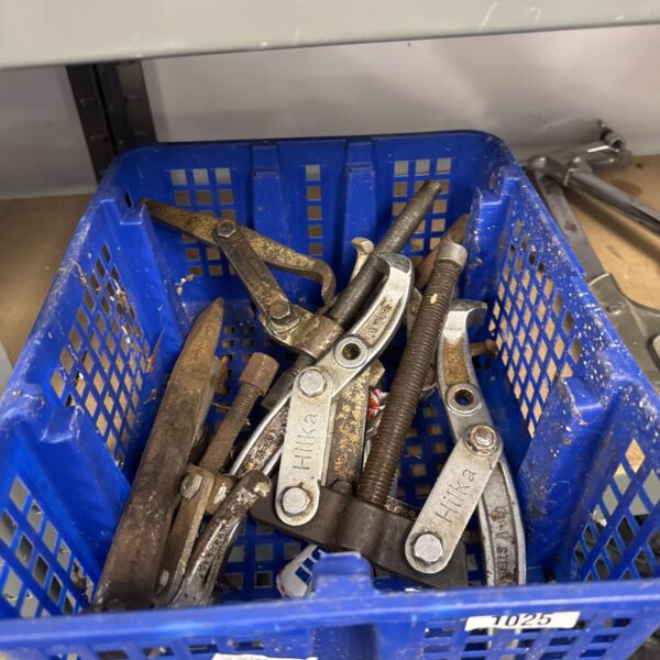 Vintage puller lot for mechanics and automotive work.
