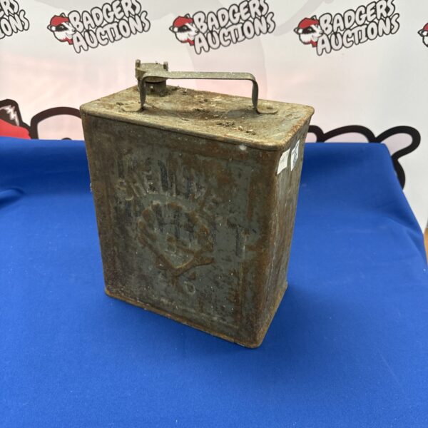 Vintage Shellmex fuel can, showing iconic branding and wear.