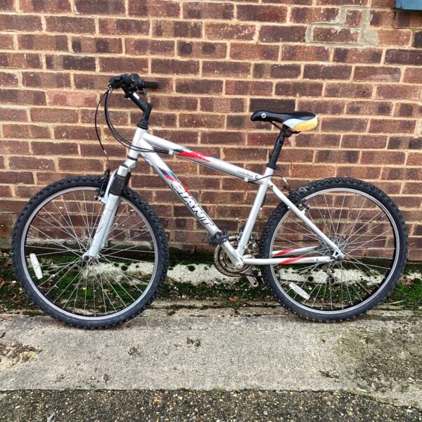 Side view of a vintage Giant Rock mountain bike.