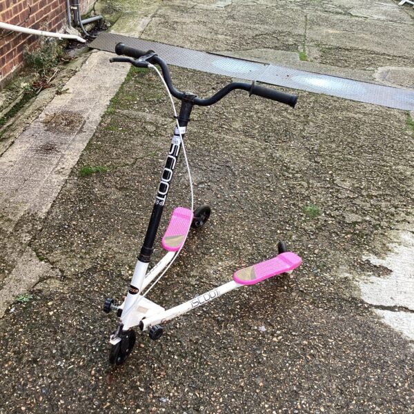 White Pro Scooter for freestyle trick riding.