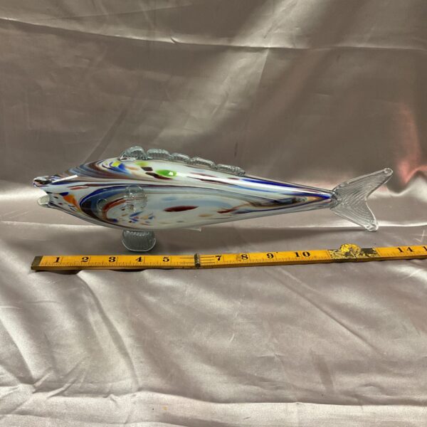Vibrant Murano glass fish sculpture with colourful swirls.