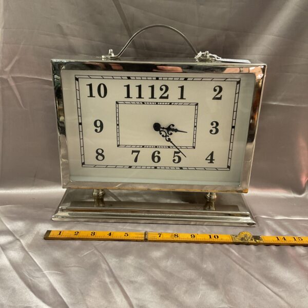 Vintage Art Deco mantle clock with chrome finish.