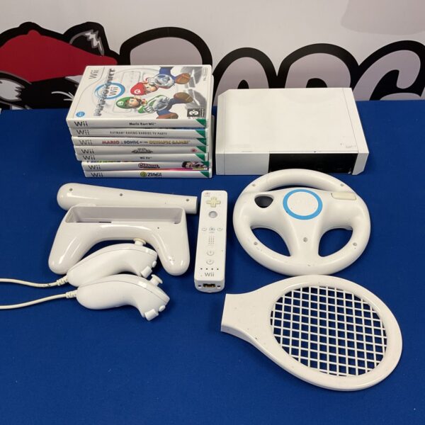 Nintendo Wii console with included games and accessories.