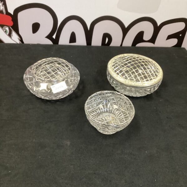 Set of three antique cut glass rose bowls for floral arrangements.