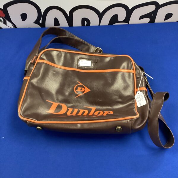 Front view of a vintage 1970s Dunlop shoulder bag.