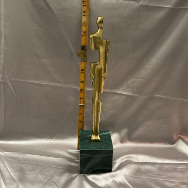 Brass modernist sculpture on a marble base, mid-century modern art.