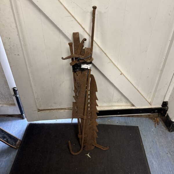 Antique blacksmith made game hanging rack with multiple hooks.