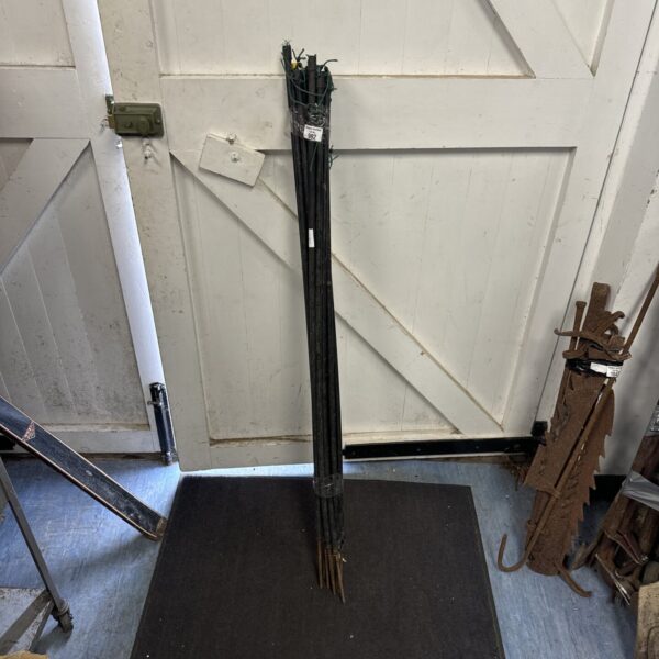 Bundle of thirteen galvanised steel electric fence rods for livestock.