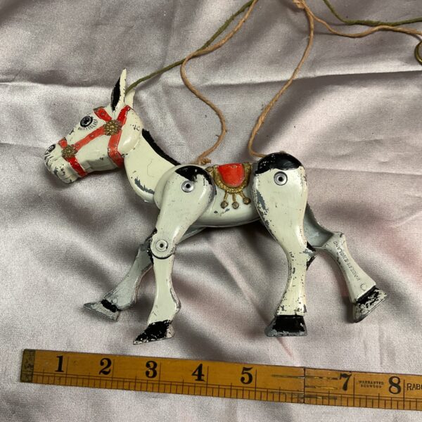 Vintage metal Muffin the Mule string puppet, collectible toy.
