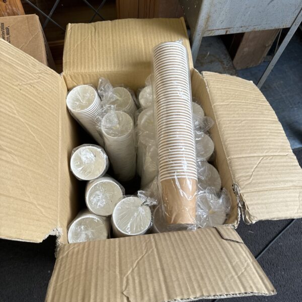 Box of disposable paper cups for beverages and parties.