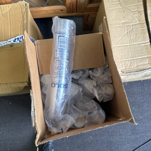 Bulk pack of unused 295ml plastic cups for events.
