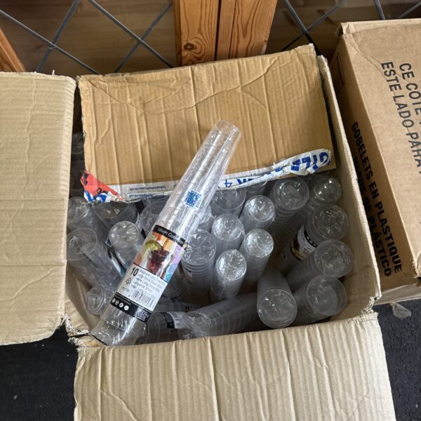 Box of disposable plastic cups for events and parties.