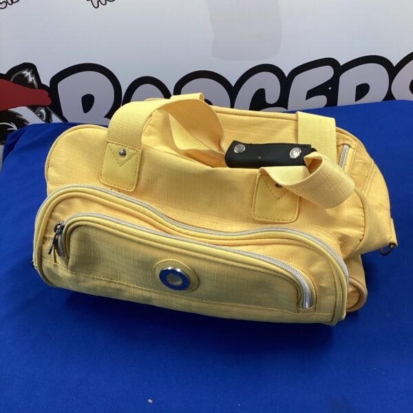 Vintage yellow Carlton International holdall, a retro travel bag.