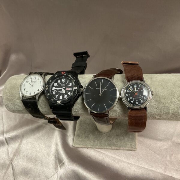 Lot of four vintage wristwatches including Casio and Timex.