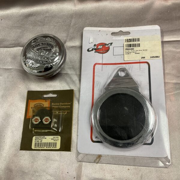 Vintage Harley Davidson tax disc holder and tyre valve caps set.