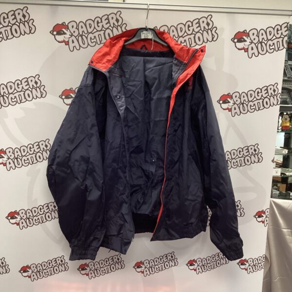 Navy blue Tornado golf waterproof jacket size XL.