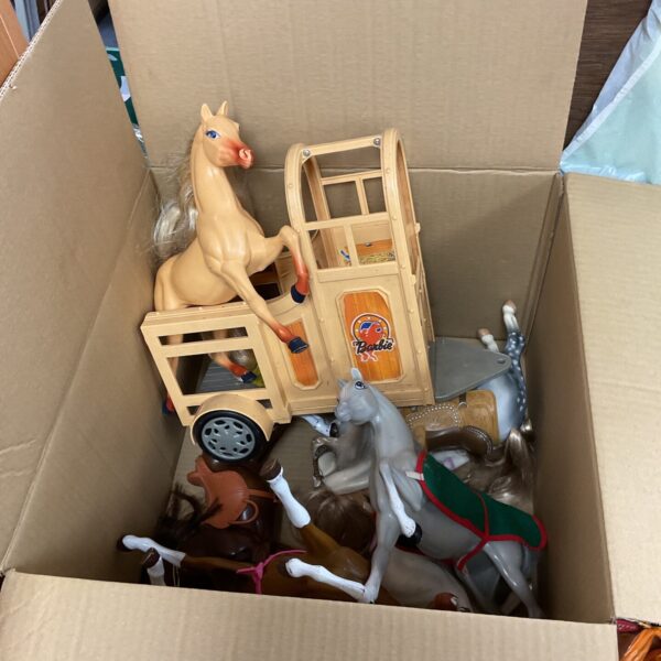 Vintage Barbie horse trailer and figurines in a lot.