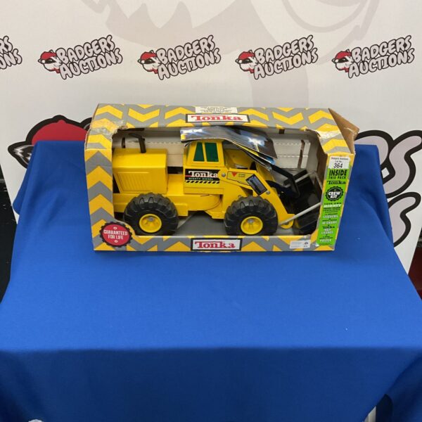 Vintage yellow Tonka Mighty Loader toy truck, model 4900.