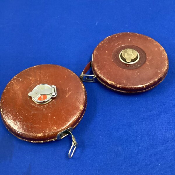 Vintage Rabone tennis measure for accurate court measurements.