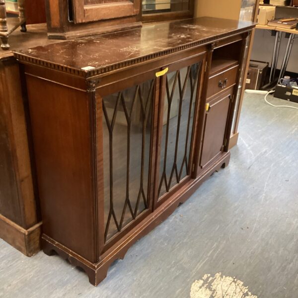 Vintage mahogany sideboard with inlaid detailing, classic furniture.